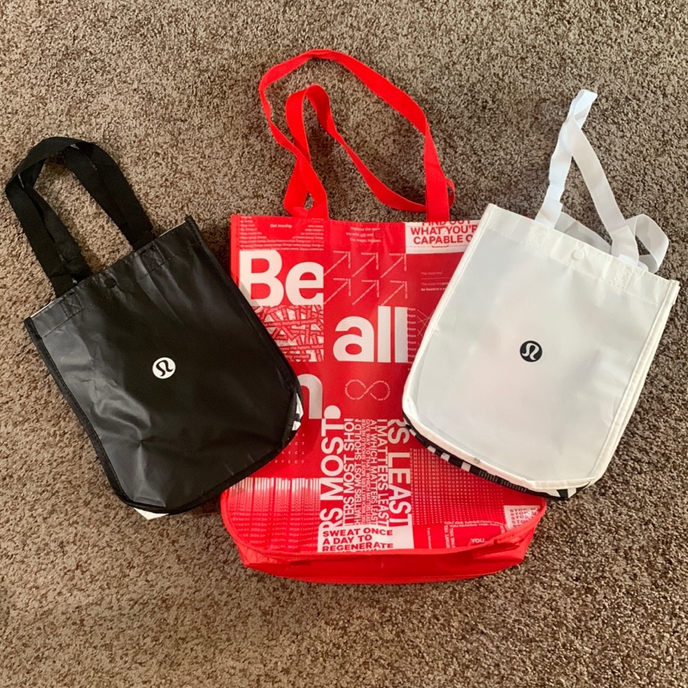 Set of 3 Lululemon shopping totes.